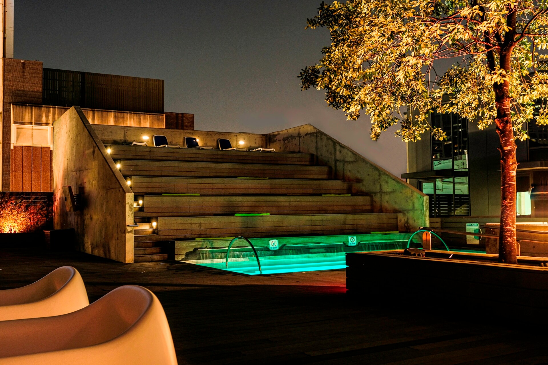 Pool lit up at night